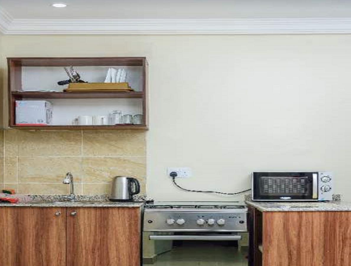215 West Apartment Абуджа Экстерьер фото